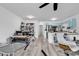 Open-concept living space with work space, seating area, and updated kitchen at 500 Fairway Village Dr. # 7-D, Myrtle Beach, SC 29588