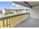 View from the carpeted patio overlooking a green lawn and neighboring houses in this delightful home setting at 500 Fairway Village Dr. # 7-D, Myrtle Beach, SC 29588