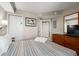 Nicely appointed bedroom showcasing a bed, dresser, and closet space for storage at 504 N Ocean Blvd. # 401, Myrtle Beach, SC 29577