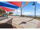 Oceanfront boardwalk with covered seating and palm trees provides stunning ocean views and beach access at 504 N Ocean Blvd. # 401, Myrtle Beach, SC 29577