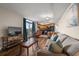 Inviting living area with modern furnishings, wood floors, and balcony access at 504 N Ocean Blvd. # 401, Myrtle Beach, SC 29577