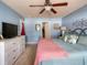 Bedroom with a large bed, dresser, and ample space, offering a comfortable and inviting atmosphere at 511 Mattamushkeet Dr., Little River, SC 29566