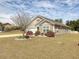 Charming single-story home with well-manicured lawn and attractive landscaping at 511 Mattamushkeet Dr., Little River, SC 29566