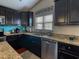 Kitchen features granite countertops, stainless steel appliances and ample cabinet space at 511 Mattamushkeet Dr., Little River, SC 29566