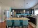 Stylish kitchen with granite counters, stainless steel appliances, and breakfast bar at 511 Mattamushkeet Dr., Little River, SC 29566