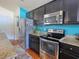 This kitchen features granite countertops, stainless steel appliances and plenty of cabinet space at 511 Mattamushkeet Dr., Little River, SC 29566