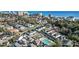 Stunning aerial view of a coastal community with homes, a pool, and the ocean in the background at 512 9Th Ave. S, North Myrtle Beach, SC 29582