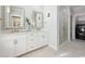 Elegant bathroom with double vanities, modern fixtures, and a glass-enclosed shower at 512 9Th Ave. S, North Myrtle Beach, SC 29582