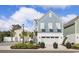 Charming two-story home with blue siding, white trim, and a well-manicured front yard at 512 9Th Ave. S, North Myrtle Beach, SC 29582
