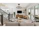 Inviting living room featuring comfortable seating, contemporary decor, a flat-screen TV, and access to the outdoors at 512 9Th Ave. S, North Myrtle Beach, SC 29582