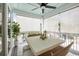 Covered porch with outdoor dining area and retractable shades at 512 9Th Ave. S, North Myrtle Beach, SC 29582