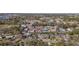 Aerial view showcasing a beautiful neighborhood, marina, and wooded areas at 514 Vallecrosia Ct., Little River, SC 29566
