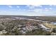 This aerial view highlights a peaceful neighborhood nestled near a waterway, surrounded by natural beauty at 514 Vallecrosia Ct., Little River, SC 29566