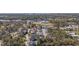 This aerial view showcases a lovely neighborhood near a serene body of water and lush green spaces at 514 Vallecrosia Ct., Little River, SC 29566