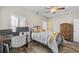 Bedroom with wood floors, closet, and a desk at 514 Vallecrosia Ct., Little River, SC 29566