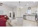 Bright kitchen featuring white cabinetry, granite countertops, and stainless appliances at 514 Vallecrosia Ct., Little River, SC 29566