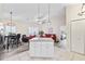 Bright open-concept living space featuring an island, dining area, and comfortable seating at 514 Vallecrosia Ct., Little River, SC 29566