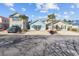 Charming coastal homes with palm trees, showcasing a relaxed neighborhood vibe at 514 Vallecrosia Ct., Little River, SC 29566
