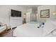 Comfortable bedroom with a beautifully decorated queen size bed, wooden floor, and natural light from the window at 515 Goldstar St., Conway, SC 29526