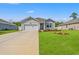 Charming single-story home with manicured lawn, attached garage, and inviting front porch at 515 Goldstar St., Conway, SC 29526