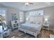 Cozy bedroom with beach-themed decor and plenty of natural light at 5223 Sea Coral Way, North Myrtle Beach, SC 29582