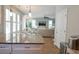 Open-concept kitchen flows into the living area with natural light at 5223 Sea Coral Way, North Myrtle Beach, SC 29582