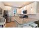 Modern kitchen with stainless steel appliances and granite countertops at 5223 Sea Coral Way, North Myrtle Beach, SC 29582