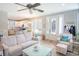 Bright and open living area with a view into the modern kitchen, perfect for entertaining guests at 5223 Sea Coral Way, North Myrtle Beach, SC 29582
