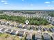 An aerial view of the home and the surrounding neighborhood with mature trees at 5628 Camilla Ct., Myrtle Beach, SC 29579