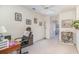 This room has a desk with a chair, storage, and lots of natural light, making it perfect for an office or study at 611 Indigo Bunting Ln. # 42 E, Murrells Inlet, SC 29576