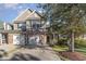 Charming townhome with brick accents, two-car garage, and inviting curb appeal at 611 Indigo Bunting Ln. # 42 E, Murrells Inlet, SC 29576