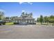Community clubhouse with ample parking, convenient for meetings and events at 6850 Blue Heron Blvd. # 205, Myrtle Beach, SC 29588
