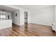 Bright living room with hardwood floors, and an open view to the kitchen area at 6850 Blue Heron Blvd. # 205, Myrtle Beach, SC 29588