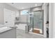 Bright bathroom featuring a soaking tub, a glass-enclosed shower, and a neutral color palette at 7205 Spoleto Dr., Myrtle Beach, SC 29572