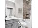 Relaxing bathroom with tub-shower combo, decorative accents, and modern sink at 7205 Spoleto Dr., Myrtle Beach, SC 29572
