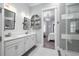Bright bathroom with double vanity, shiplap wall and modern fixtures at 730 Farrow Pkwy. # D, Myrtle Beach, SC 29577