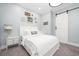 Comfortable bedroom with a decorative Gathering sign, barn door, and ample lighting at 730 Farrow Pkwy. # D, Myrtle Beach, SC 29577