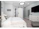 Serene bedroom featuring neutral colors, white furniture, and a sliding barn door at 730 Farrow Pkwy. # D, Myrtle Beach, SC 29577