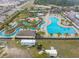 Aerial view of the lazy river and large community pool with ample seating at 730 Farrow Pkwy. # D, Myrtle Beach, SC 29577