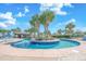 Outdoor community lazy river with lush landscaping and lounge chairs and tables at 730 Farrow Pkwy. # D, Myrtle Beach, SC 29577