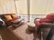 Cozy screened porch with comfortable seating and stylish outdoor decor at 730 Farrow Pkwy. # D, Myrtle Beach, SC 29577