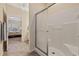 Bathroom featuring a glass enclosed shower and tile flooring at 765 Pinehurst Ln. # 96-C, Pawleys Island, SC 29585