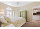 Bright bedroom featuring a vaulted ceiling, shuttered windows, and a modern dresser at 765 Pinehurst Ln. # 96-C, Pawleys Island, SC 29585