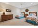 Shared bedroom with twin beds, coordinating decor, and ample natural light at 765 Pinehurst Ln. # 96-C, Pawleys Island, SC 29585