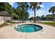 Close-up of a relaxing hot tub with clear water, surrounded by lush landscaping and seating at 765 Pinehurst Ln. # 96-C, Pawleys Island, SC 29585