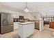 Charming kitchen featuring a center island, stainless steel appliances, and white cabinetry at 765 Pinehurst Ln. # 96-C, Pawleys Island, SC 29585