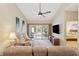 Inviting living room with a ceiling fan and sliding glass doors leading to the patio at 765 Pinehurst Ln. # 96-C, Pawleys Island, SC 29585