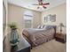 Bedroom featuring a large plant in front of an arched window at 822 Foxtail Dr. # 822, Longs, SC 29568
