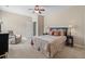 This bedroom includes a ceiling fan, lamps, and comfortable chair at 822 Foxtail Dr. # 822, Longs, SC 29568