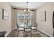 Charming breakfast nook with bright natural light and seating for four at 822 Foxtail Dr. # 822, Longs, SC 29568